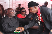 Ajoss shakes hands with vice president Bawumia at a funeral