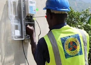 ECG staff working on a meter