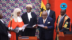 Prof Mike Oquaye being sworn-in as Acting President