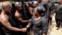 Chief of Staff, Frema Opare Osei shaking hands with Hackman Owusu Agyeman at the ceremony