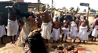 Aflao traditional priests offering sacrifice to deities of the land