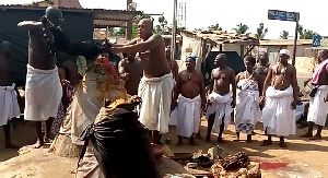 Aflao traditional priests offering sacrifice to deities of the land