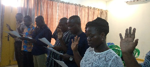 Members of the committee being sworn in