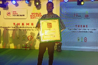 Mr Albert Futukpor, Editor at the Tamale Office with his award