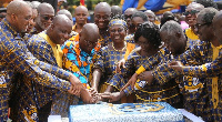 President Akufo-Addo cutting the 60th-anniversary cake