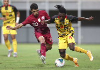 A photo of Gideon Mensah playing for the Black Stars of Ghana