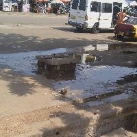 The manhole, is spilling faecal matter onto the street