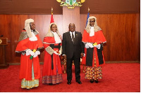 President Akufo-Addo (middle) with three new Supreme Court Judges