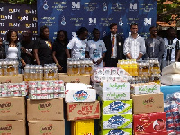 Kwadwo Asamoah and Metro TV  donated food and items worth thousands of cedis to inmates