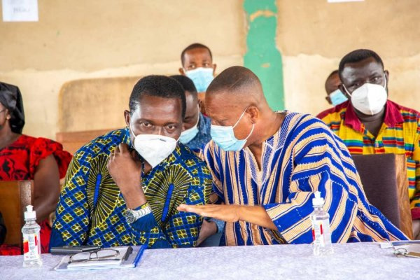 Adutwum (left) in an interaction with a top party functionary in the Bosomtwe constituency