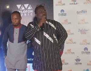 MUSIGA President, Obour (R)