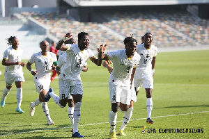 Black Stars players celebrating with Mohammed Salisu after he scored the against Switzerland