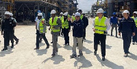 Mr K.T Hammond (middle) inspecting work on the refinery at Tema