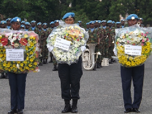 Officers Holding Wreathes