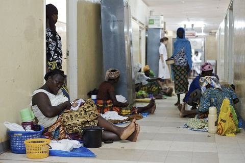 File photo of nursing mothers sitting on the floor at a hospital