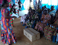 Mrs. Matilda Amissah-Arthur presenting the items to the Tikobo No. 2 Traditional Council