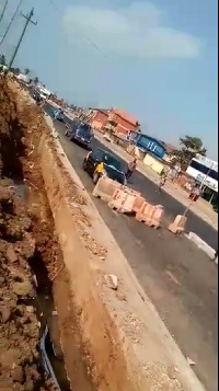 Parts of the Nungua road that was destroyed by thieves