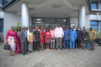 Members of the chamber in a group photo after launch