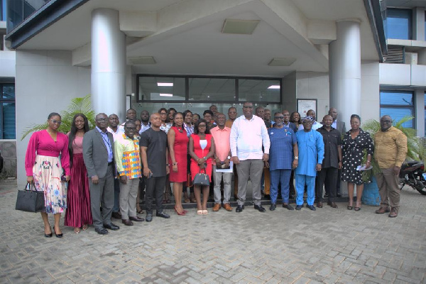 Members of the chamber in a group photo after launch