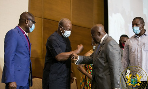 John Mahama exchanging pleasantries with Akufo-Addo