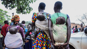 Teenage mothers with their babies in Teobia Village, Kole District