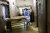 The mortuary workers are complaining of being overworked and also underpaid for their services