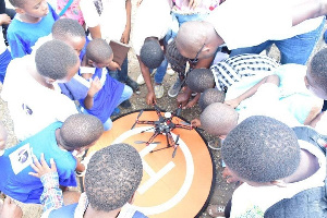 Some students building a robot