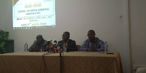 Deputy Director of Public Health, Dr Ekow Otoo(middle) addressing the media