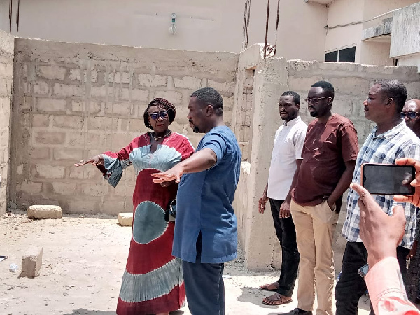 Dzifa Gomashie being shown around the new unit