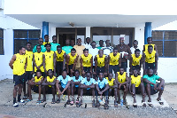 Black Sharks Management Committee with players in a group picture