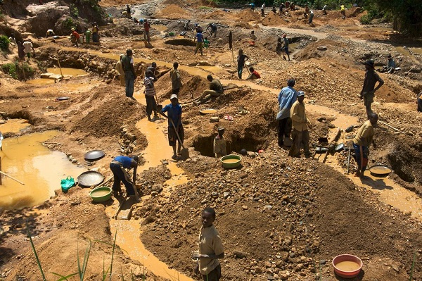 File Photo [Illegal miners at a site]