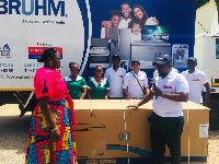 Frank Mickson-Yeboah  presenting the items to the staff of the psychiatric hospital