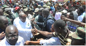 Supporters of the NDC welcome President Mahama at Kaneshie