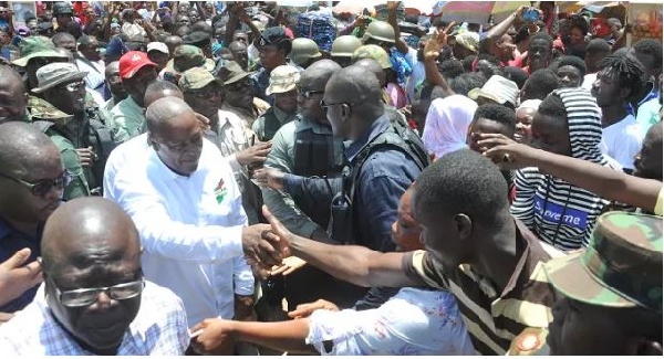 Supporters of the NDC welcome President Mahama at Kaneshie