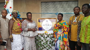 Nana Adwoa Korantiwaa II presenting the items to the beneficiaries