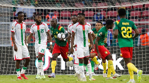 Cameroon striker, Vincent Aboubakar recovering the ball after scoring against Burkina