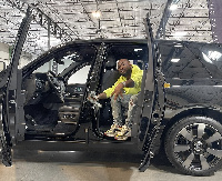 Davido poses in his new car