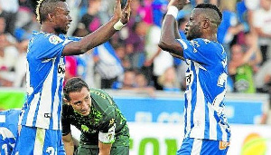 Mubarak Wakaso celebrates with Patrick Twumasi