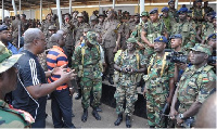 President Mahama interacting with some military personnel