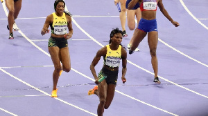 Despite a valiant effort, Andrenette Knight dropped the baton after contact with an Irish athlete