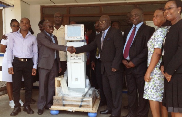 Management of Tema Lube Oil presenting the ventilator to Dr Kwabena Opoku-Adusei