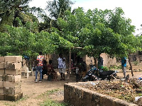 Family of the deceased gathered at his home