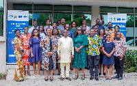 Participants in a group photo after the forum