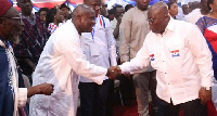 President Akufo Addo in a handshake with Kwabena Agyepong