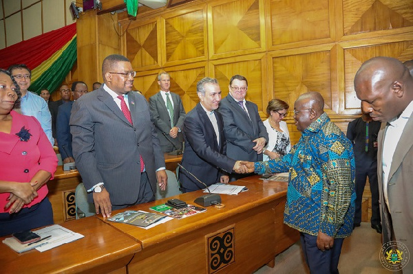 President Akufo-Addo exchanging pleasantries with participants at the launch of ECTIB