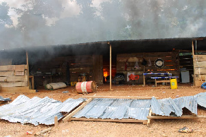 Burning Galamsey Shack 1.jpeg