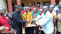 Dr. Rasheed Kwesi Etuaful receiving the nomination forms