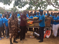 Members of St Peter and Paul Commandery #747 donates to Awutu Prison camp