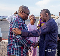 Former  President John Dramani Mahama in a handshake with Alban Bagbin