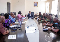 Officials from the Ghana Armed Forces Medical Services and the NHIA Executive Management team